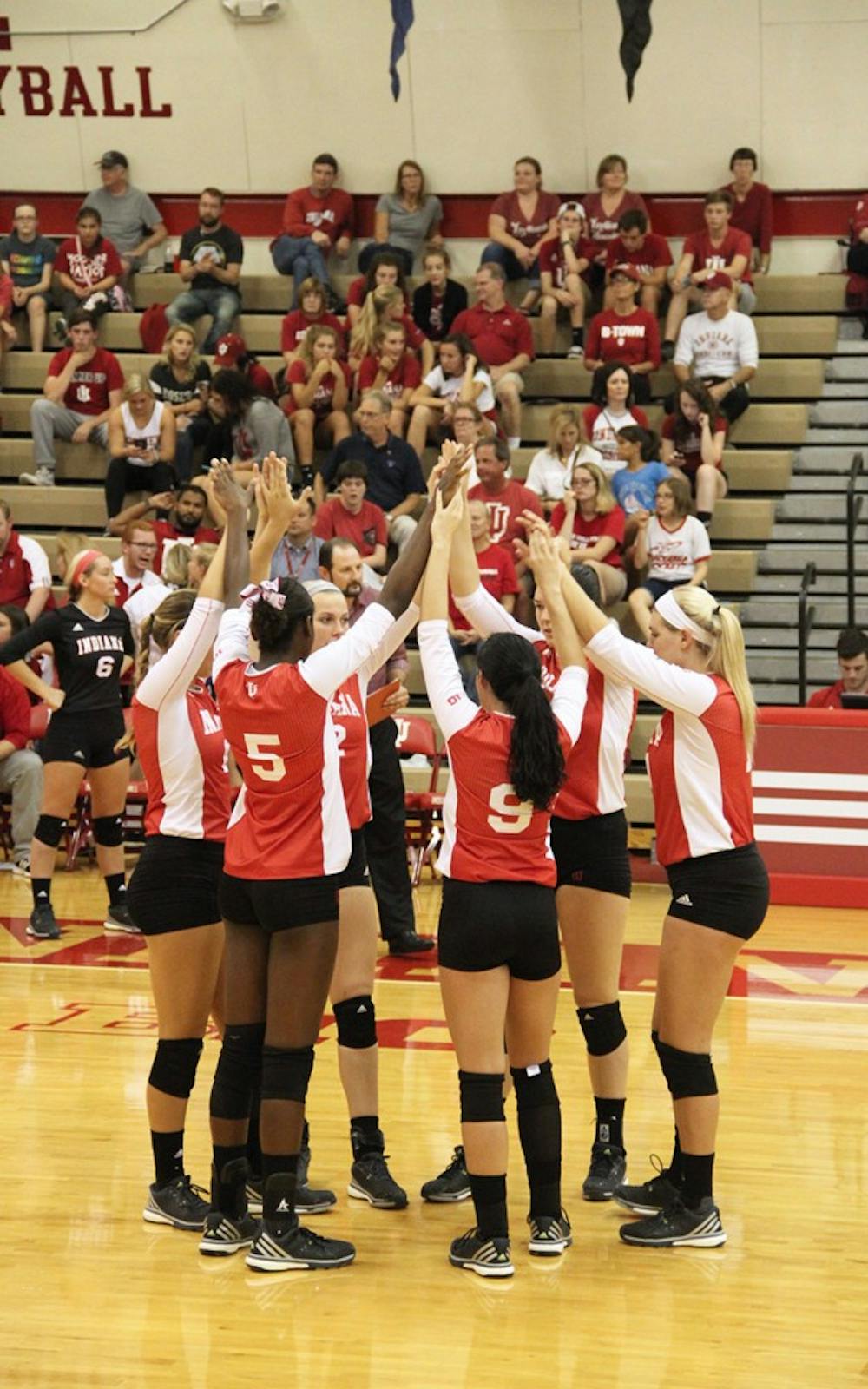 Indiana University Women Volleyball cheers before they start competing against the Northwestern on Wednesday.