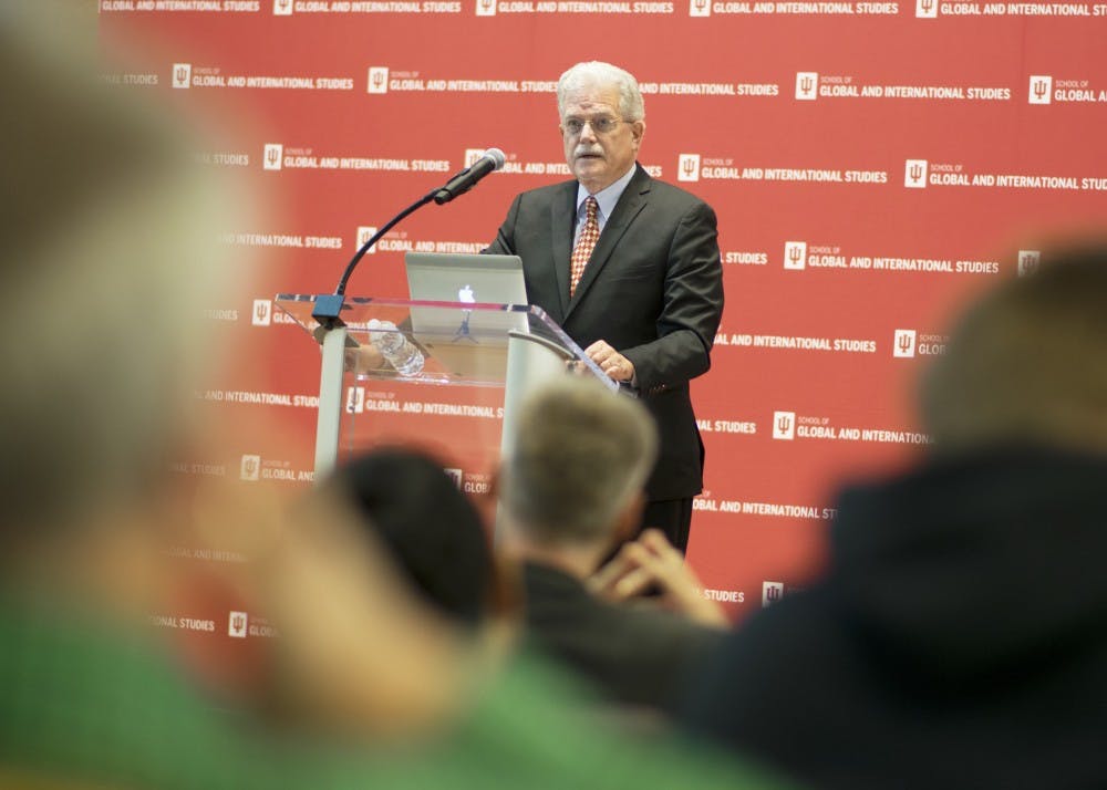 Bruce Cumings, the keynote speaker at "Assessing Korean Democratization and Democracy: From Molotov Cocktails to Candle Lights," speaks in the Global and International Studies Building auditorium Friday morning. Cumings, who is a professor at the University of Chicago, spoke on three episodes of violence that occurred before, during and after the Korean War and how they influenced Korea's path to democratization. 