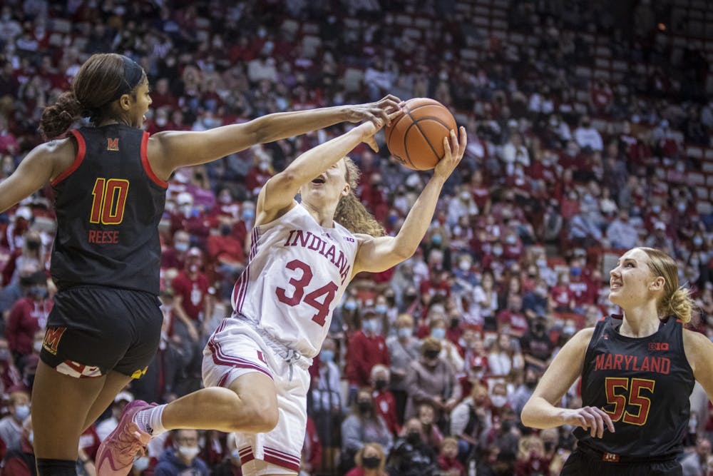 <p>Senior guard Grace Berger gets fouled on a layup Jan. 2, 2022, at Simon Skjodt Assembly Hall. IU lost to Maryland on Feb. 25, 2022, 64-67.</p>