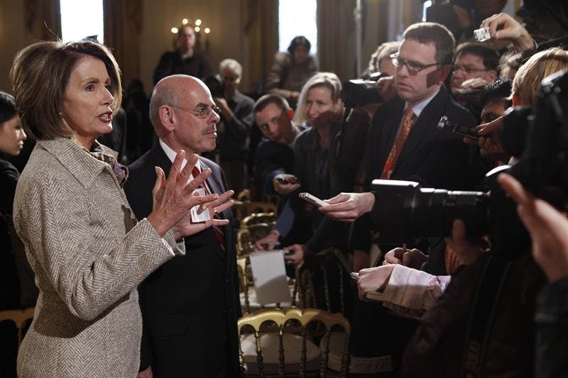 House Speaker Nancy Pelosi, D-Calif., and Rep. Henry Waxman, D-Calif., speak to reporters Monday in the East Room of the White House in Washington after President Barack Obama convened the Fiscal Responsibility Summit.