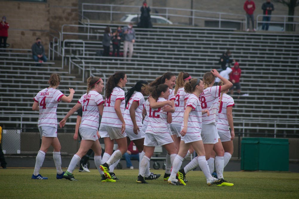 <p>The IU women&#x27;s soccer team huddles together Feb. 28, 2021 at Bill Armstrong Stadium during a game against Iowa. Their next game will be Aug. 25, 2022, against Ball State. </p>