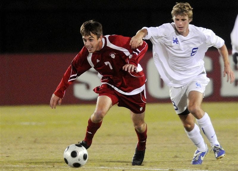 IU junior midfielder Eric Alexander, left, steals the ball from Kentucky defender Jason Griffiths during a soccer game Wednesday night at Bill Armstrong Stadium.