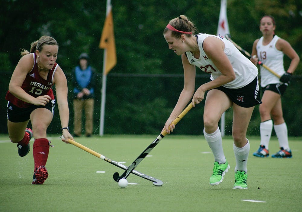 Junior Kate Barber, midfielder for Indiana, battles for the ball against a Miami of Ohio player. The Hoosiers would go on to fall to Miami 3-1 on September 11th at the IU Field Hockey Complex.