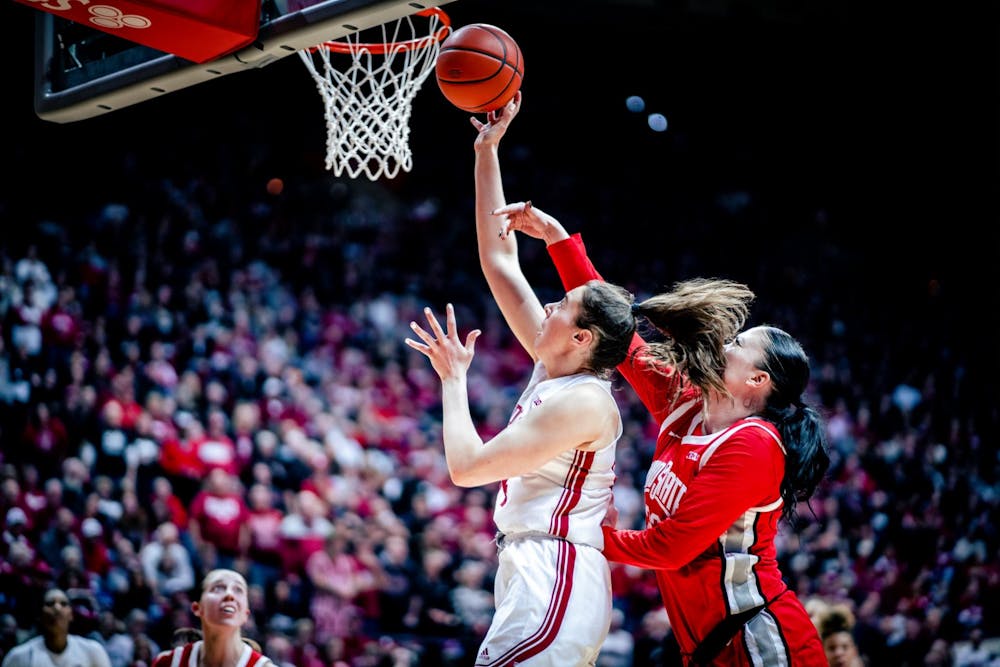 <p>Senior forward MacKenzie Holmes lays in a shot Jan. 26, 2023, at Simon Skjodt Assembly Hall in Bloomington. The Hoosiers beat Minnesota 77-54 Wednesday night.</p>