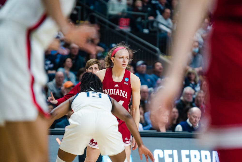 <p>Then-senior guard Grace Berger dribbles the ball March 26, 2022, at Total Mortgage Arena in Bridgeport, Connecticut.</p>