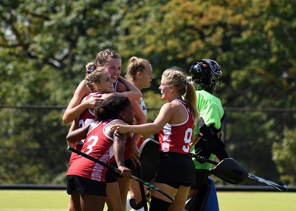 <p>IU celebrates after senior forward Maddie Latino scores the game-winning goal against Ball State at the IU Field Hockey Complex. IU defeated Ball State Sunday.</p>