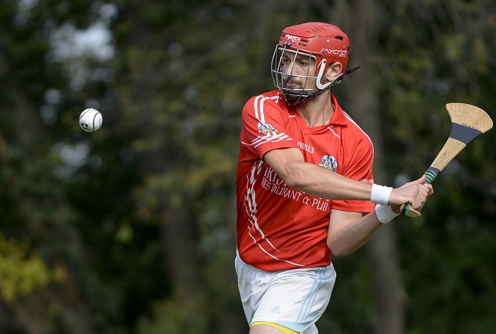 Team captain Cody Hedges gets ready to hit the ball during IU's hurling match against Purdue on Saturday at Tri-North Middle School.