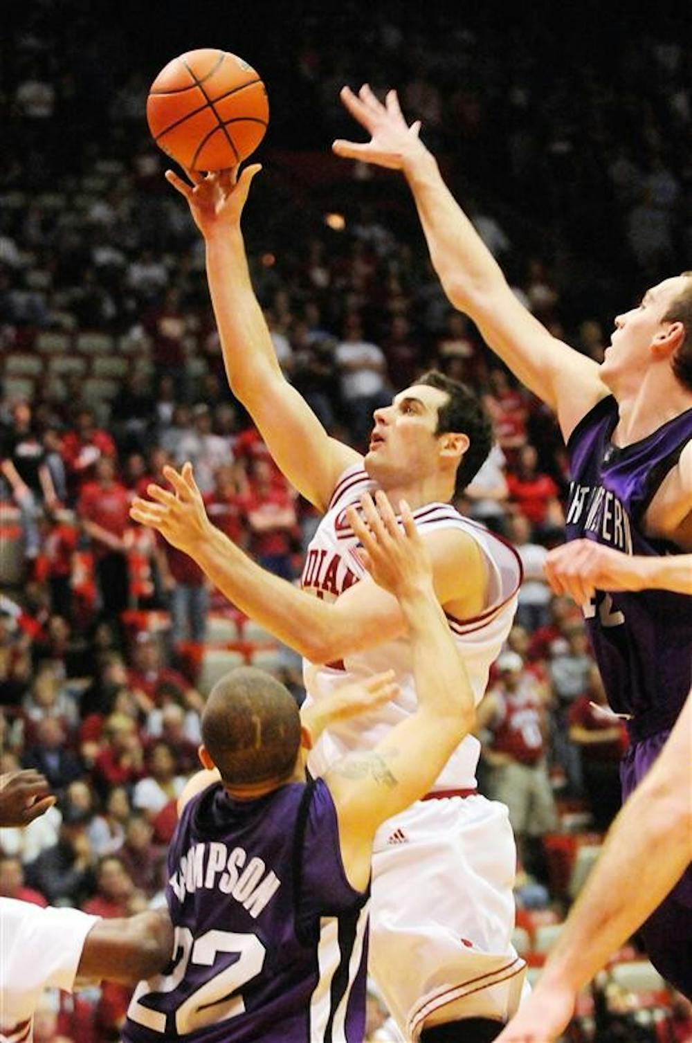 IU senior forward Kyle Taber goes in for a layup during the second half of IU's 75-53 loss to Northwestern Feb 25 at Assembly Hall. Taber led the Hoosiers with a career high 12 points in the loss.