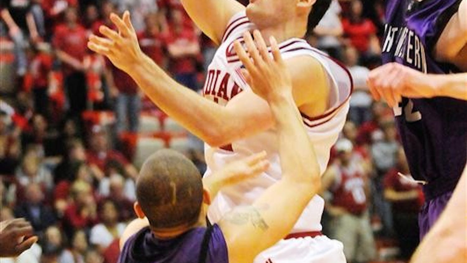 IU senior forward Kyle Taber goes in for a layup during the second half of IU's 75-53 loss to Northwestern Feb 25 at Assembly Hall. Taber led the Hoosiers with a career high 12 points in the loss.