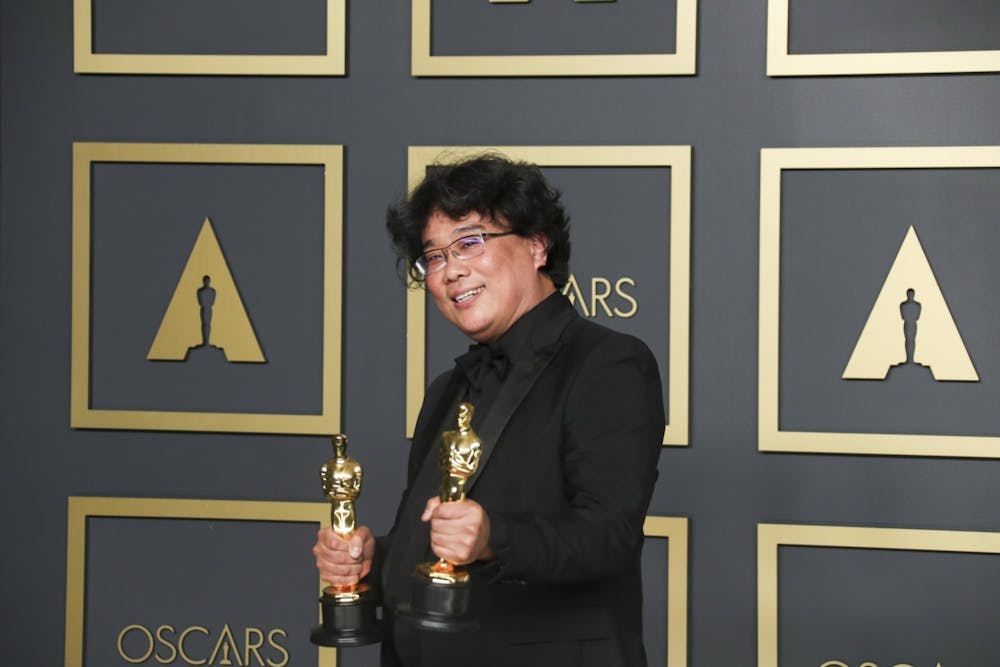 <p>Director Bong Joon-ho poses in the photo room at the 92nd Academy Awards Feb. 9 at the Dolby Theatre in Hollywood, California. His film, &quot;Parasite&quot;, was the winner of the International Feature and Best Picture Oscar.</p>