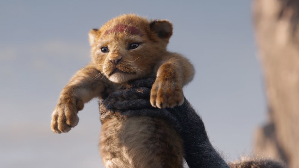 A still from the 2019 movie &quot;The Lion King&quot; is shown. Since 2014, there have been 14 Disney live-action remakes and sequels.