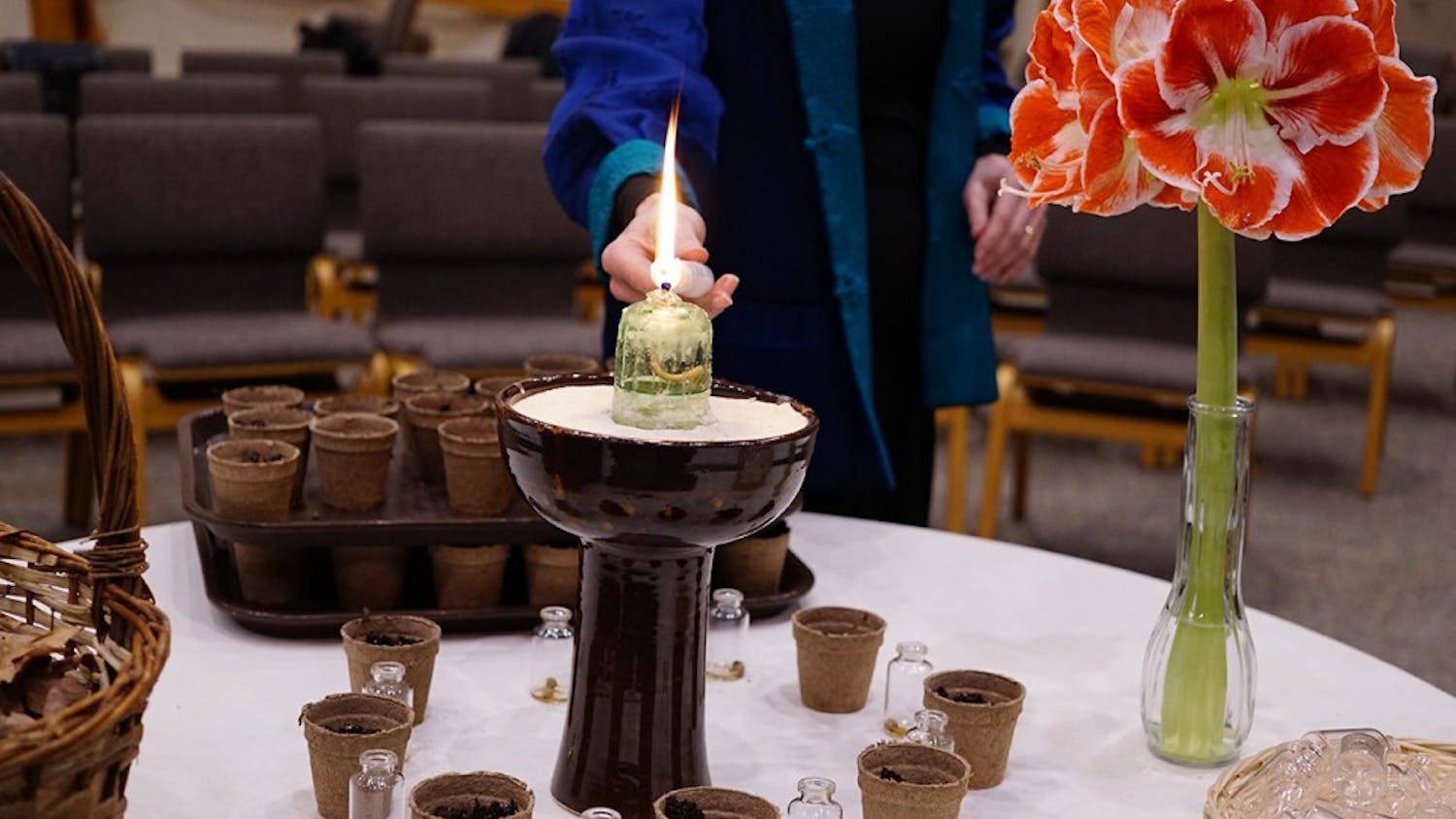 A candle is lit after the spring equinox celebration Monday evening&nbsp;at the Unitarian Universalist Church. Spring equinox is the beginning of the spring season.