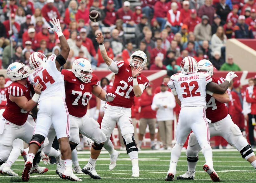 Senior quarterback Richard Lagow throws a pass during the first half against Wisconsin on Oct. 4 at Memorial Stadium. Lagow will be the starting quarterback again this week for IU.