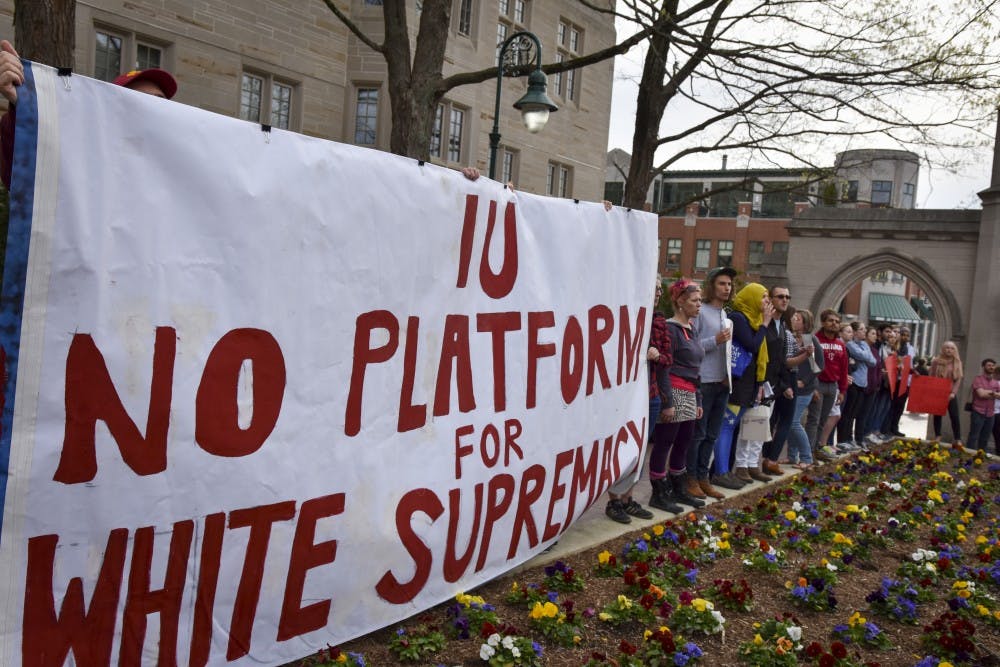 Protestors gather around Franklin Hall to chant in protest against white supremacist Charles Murray during his speech Tuesday evening in President’s Hall. Controversy arose in the student body upon discovery that Murray had been invited to speak at IU with little notice.