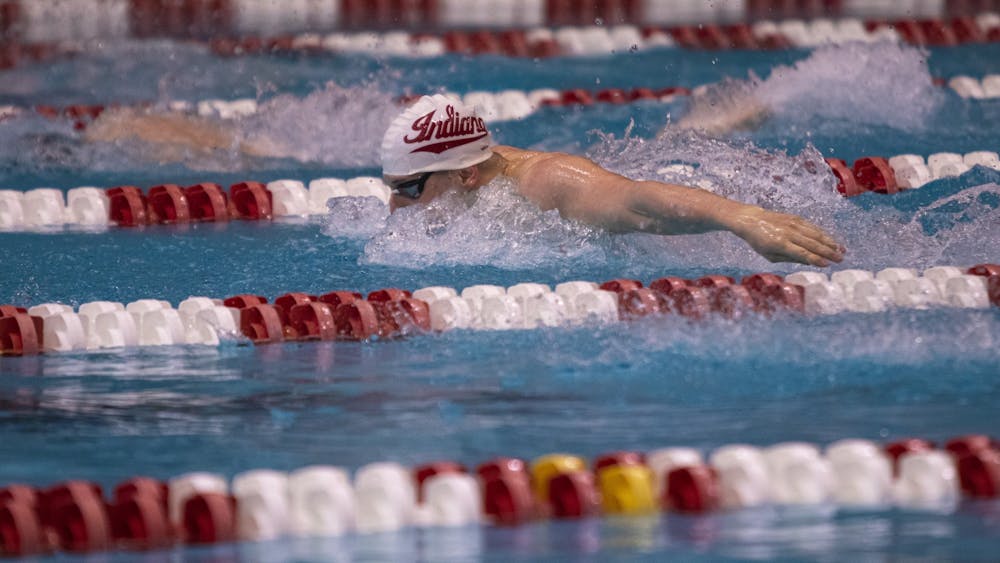 Then-sophomore Jakub Karl competes in a butterfly event Feb. 29, 2020, at Counsilman-Billingsley Aquatics Center. Indiana and Michigan mutually agreed to cancel their swim and dive meet scheduled for Saturday due to COVID-19 concerns.