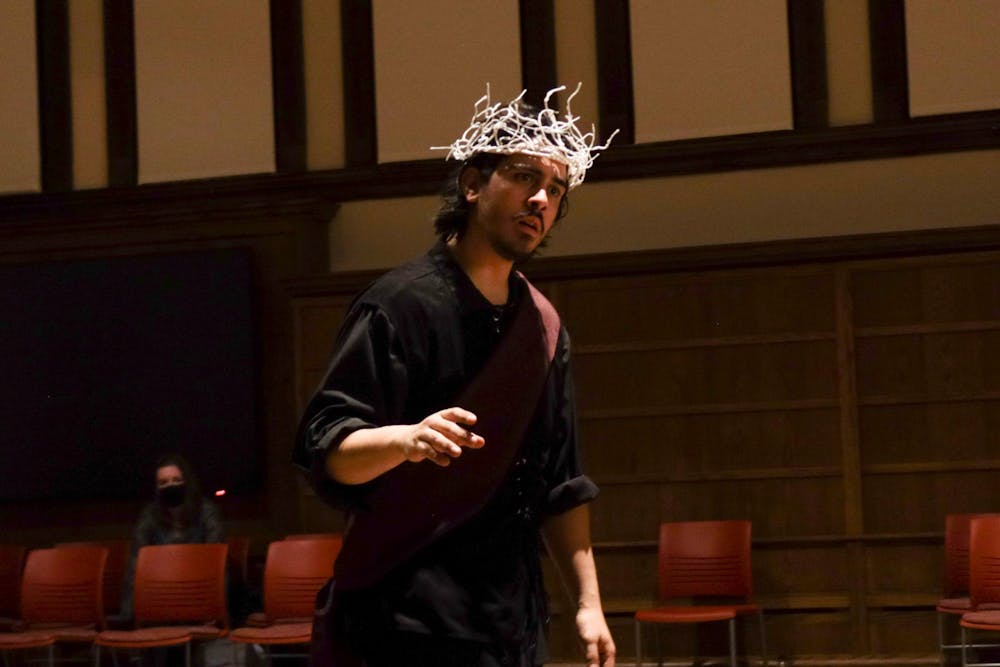 <p>Second year MFA acting student Christopher Centinaro is seen during one of his monologues as Macbeth on Wednesday in Maxwell Hall. Macbeth will be showing Thursday through Saturday at Gayle Karch Cook Center for Public Arts &amp; Humanities in Maxwell Hall. </p>
