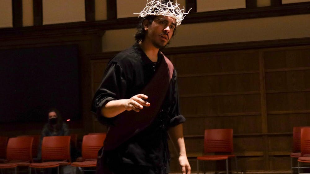 Second year MFA acting student Christopher Centinaro is seen during one of his monologues as Macbeth on Wednesday in Maxwell Hall. Macbeth will be showing Thursday through Saturday at Gayle Karch Cook Center for Public Arts &amp; Humanities in Maxwell Hall. 