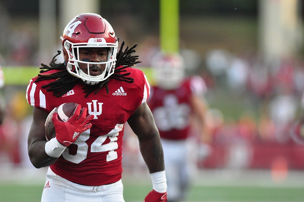 Junior running back Devine Redding sprints towards an IU touchdown in the third quarter at Memorial Stadium. IU lost to Nebraska 27-22.