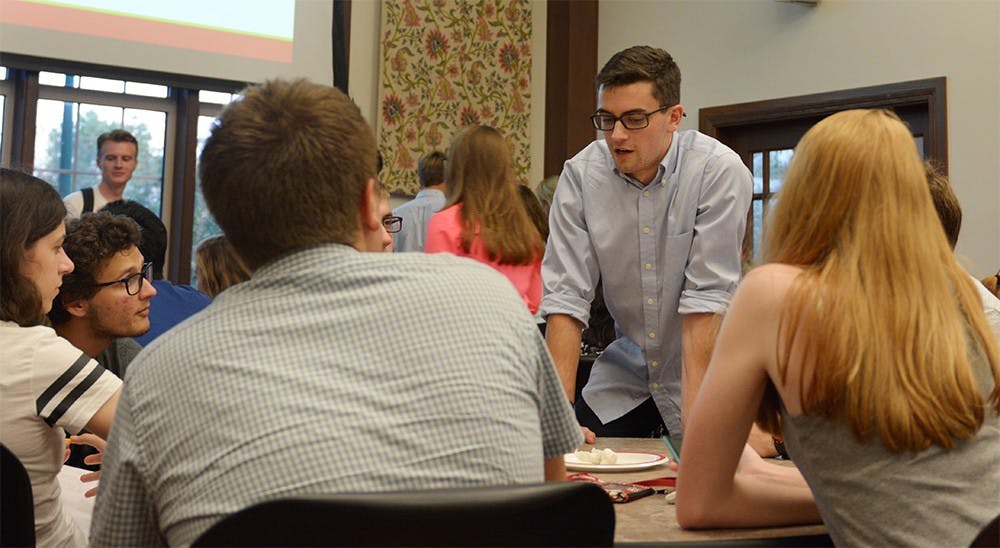 Ari Stoner, IU senior and excutive producer of TEDxIndianaUniversity, talks to students who attended a call out meeting on Monday night at the Hutton Honors College Great Room. Stoner said they are "trying to make things happen fast."