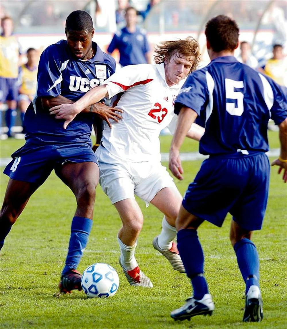 The Hoosiers' Peterson fights with UCSB defender Andy Iro for a loose ball in the NCAA title game in 2004. Peterson was IU's lone goal scorer in the game.