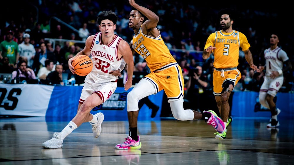 Junior guard Trey Galloway drives to the basket March 17, 2023, at MVP Arena in Albany, New York. Indiana defeated Kent State 71-60.