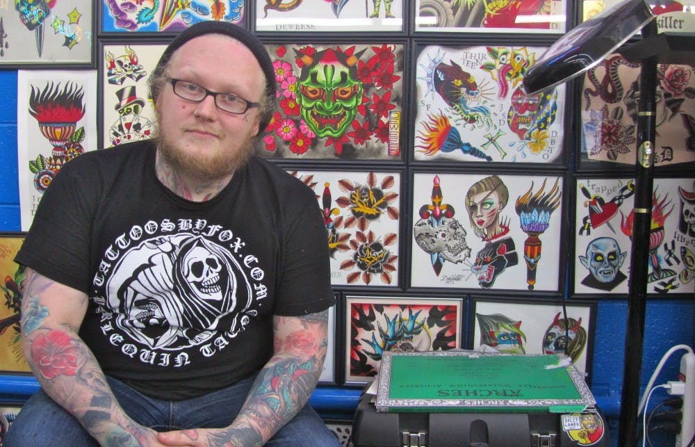 John DeWeese, a local tattoo artist, painted most of the tattoo design art lining the parlor's walls. 