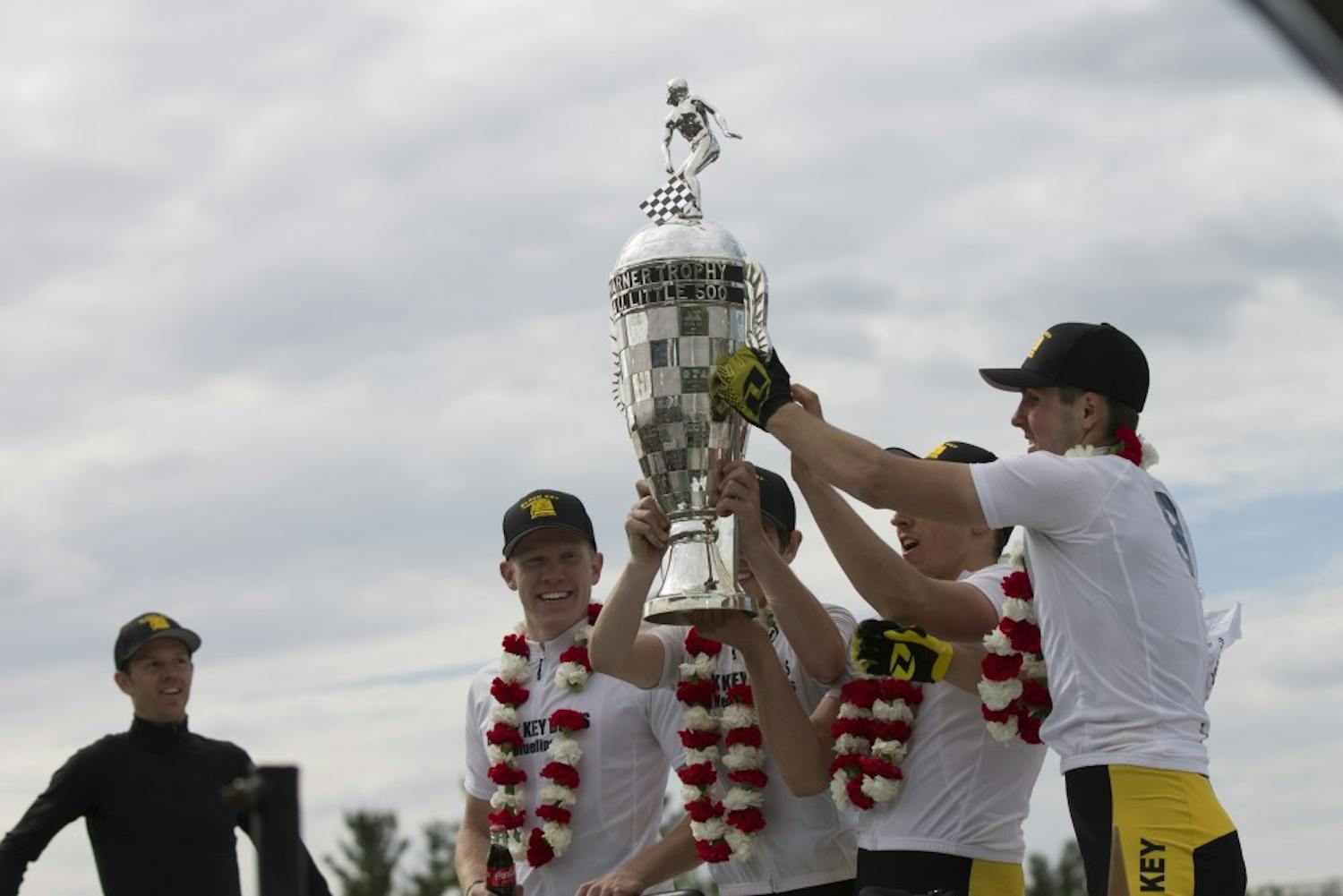 Black Key Bulls riders hold up the trophy Saturday afternoon&nbsp;after winning the 67th running of the men's Little 500 race.&nbsp;