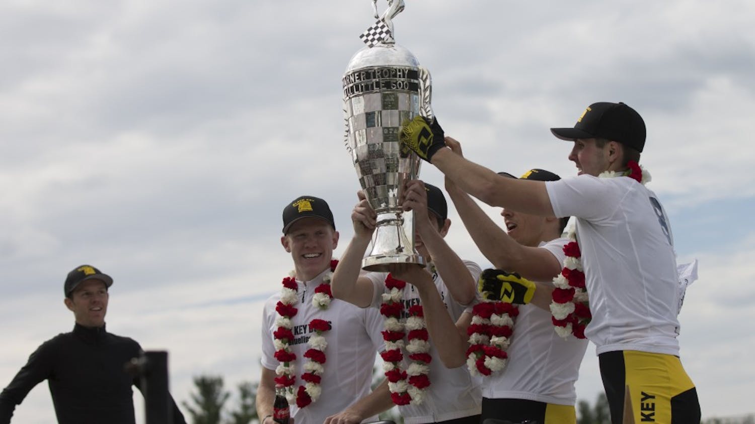 Black Key Bulls riders hold up the trophy Saturday afternoon&nbsp;after winning the 67th running of the men's Little 500 race.&nbsp;