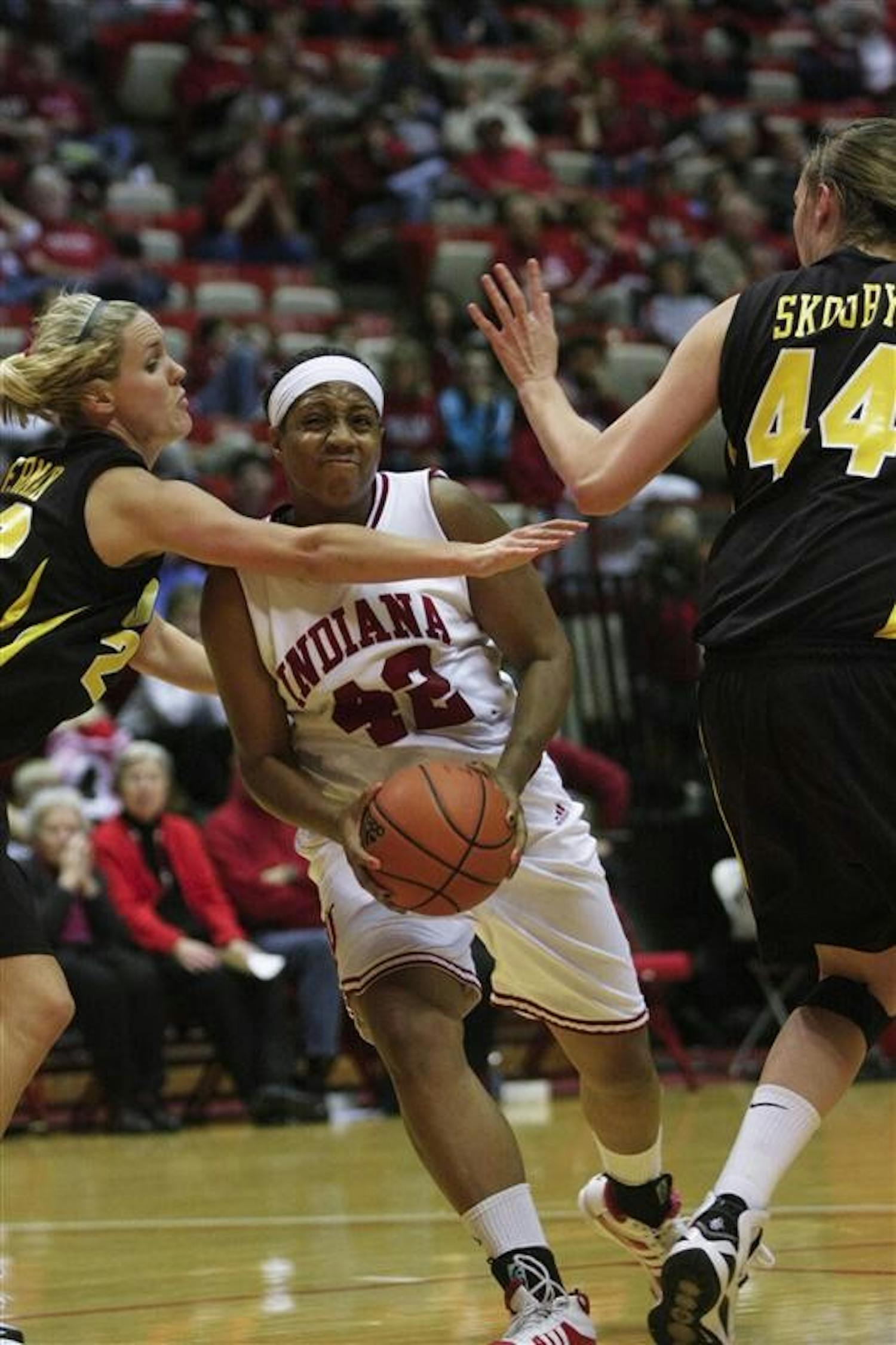 Senior forward Amber Jackson attempts to get past Iowa's guards during the women's basketball game January 4, 2009. 