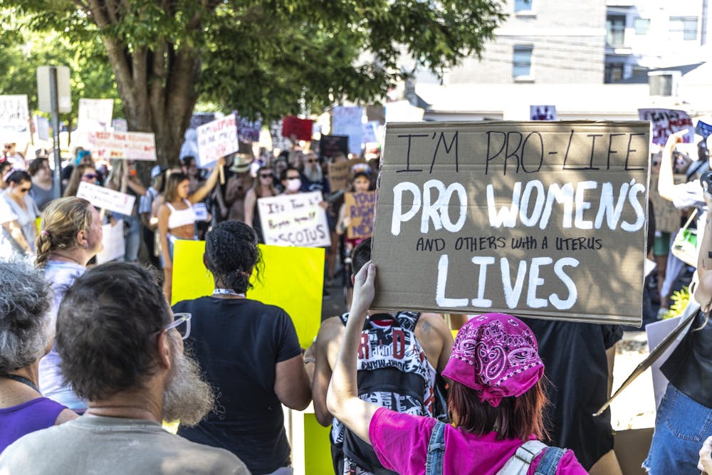 <p>Abortion-rights protestors gather in front of the Women’s Care Center on June 27, 2022, on College Avenue during a demonstration organized by the Party for Socialism and Liberation.</p>