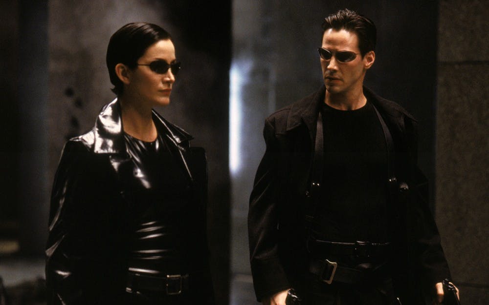Carrie-Anne Moss and Keanu Reeves star in "The Matrix."