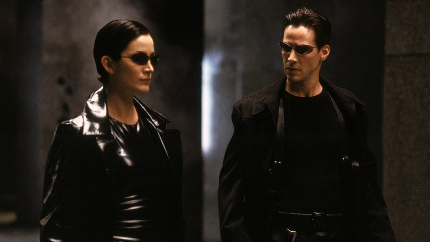 Carrie-Anne Moss and Keanu Reeves star in "The Matrix."