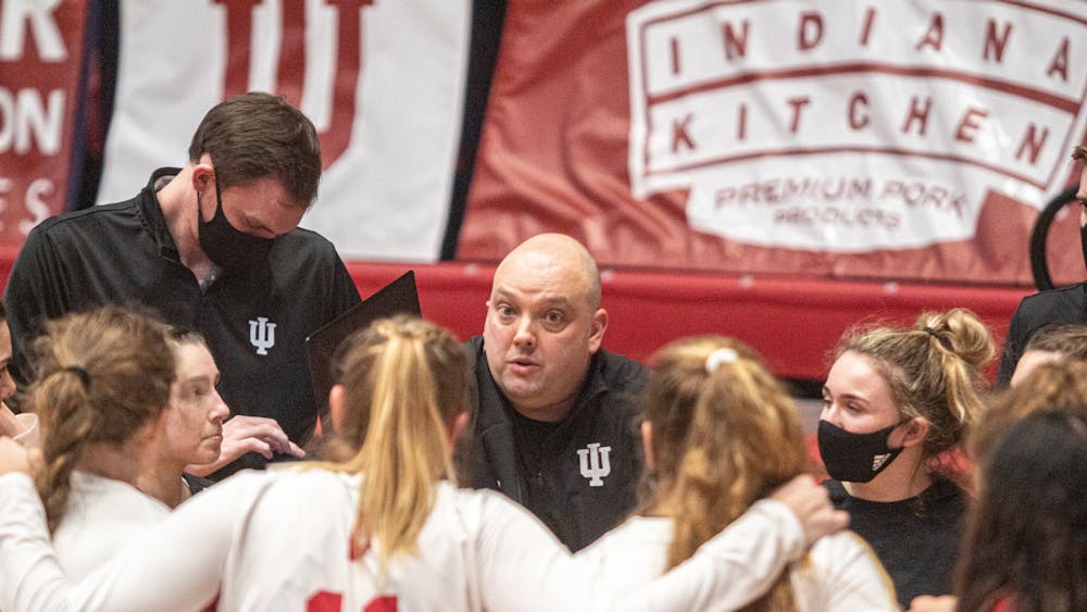 Head coach Steve Aird talks to his team during a break in the action Feb. 12 at Wilkinson Hall. IU lost to Penn State on the road 0-3 on Saturday.
