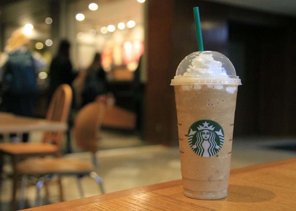 The Pumpkin Spice Latte/Frappuccino from Starbucks is a fan favorite among the fall drinks Starbucks serves. The pumpkin flavoring gives it a light orange hue, and it can be ordered hot or cold. 