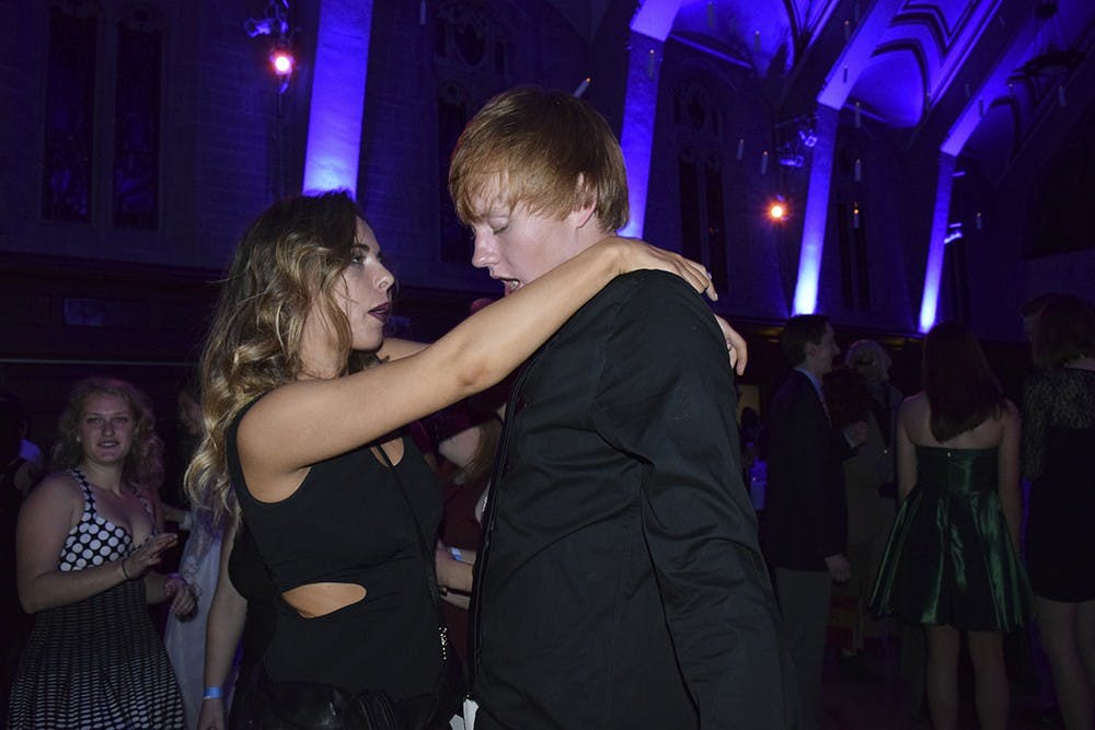 Students dances in the event titled Union Board's second annual Yule Ball on Friday Evening at IMU Alumni Hall. Food, dancing, and live music are presented in this events. 