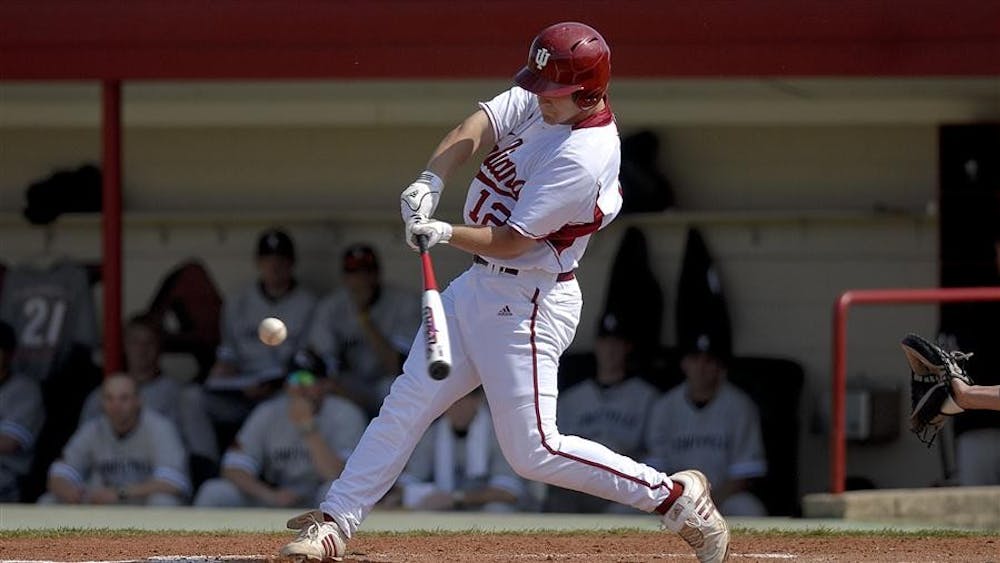 Sophomore center fielder Alex Dickerson hits a ground ball during IU's 5-4 loss to Louisville March 31 at Sembower Field.