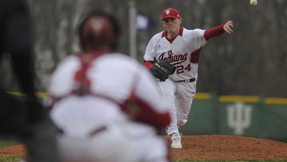 Junior pitcher Drew Leininger pitches to senior catcher Wes Wilson during IU's 12-8 victory against Shawnee State on Wednesday at Sembower Field.