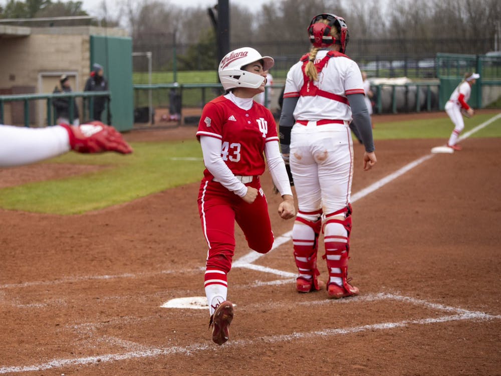 Freshman Elle Smith celebrates after scoring a run April 1, 2023, at Andy Mohr Field in Bloomington. Indiana softball was named the No. 2 seed in the Knoxville regional in the NCAA Tournament. 