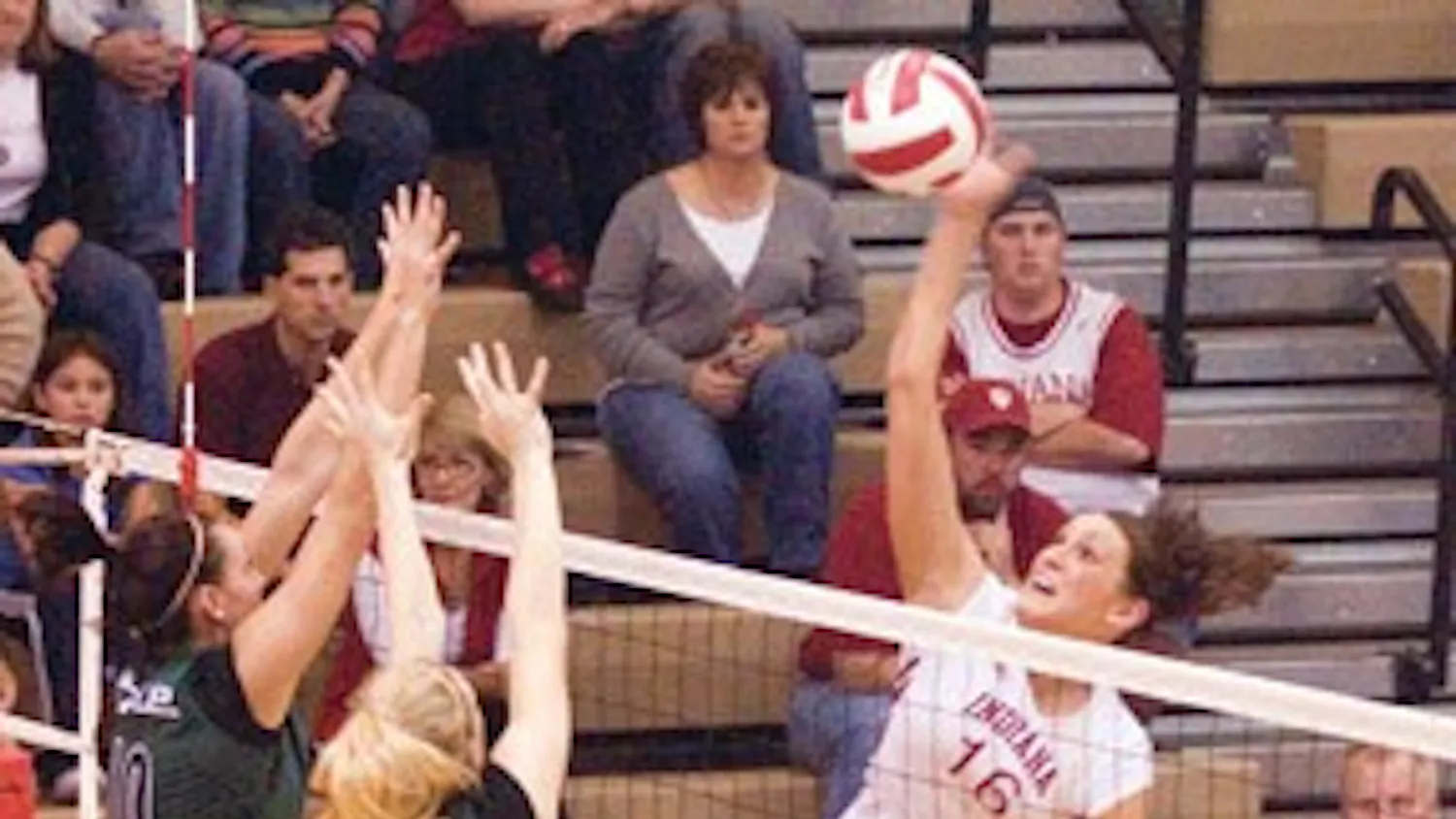 IDS File Photo
Junior outside hitter Gabrielle Allison prepares a spike against Michigan State juniors Jessica Hohl and Ashley Schatzle Nov. 24, 2006 evening at the University Gym. The Hoosiers lost to the Spartans 3-0.