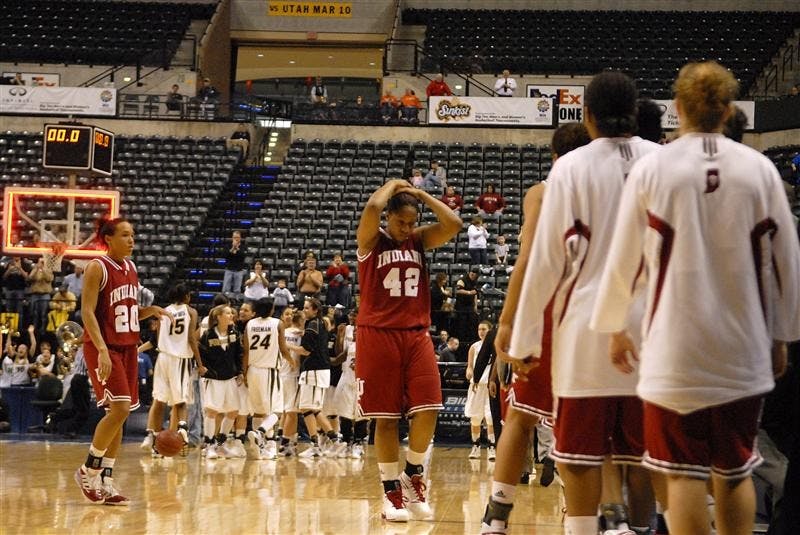 IU senior forward Amber Jackson, center, walks off the court after IU’s 68-64 loss to Purdue in the second round of the Big Ten Tournament on Friday in Indianapolis. Jackson had 13 points in the loss.