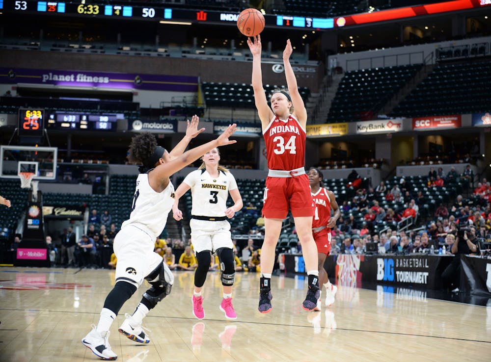 <p>Freshman guard Grace Berger shoots the ball during IU&#x27;s third round Big Ten Tournament game against Iowa on March 8 in Bankers Life Fieldhouse in Indianapolis. The IU women&#x27;s basketball team was ranked No. 24 in the nation, according to the Associated Press top-25 preseason poll released Wednesday.</p>