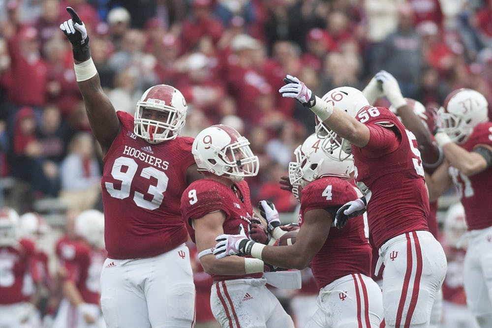 Then-freshman Ralphael Green and the IU defense celebrates after recovering a fumble during IU's game against Minnesota on Nov. 2, 2013 at Memorial Stadium.