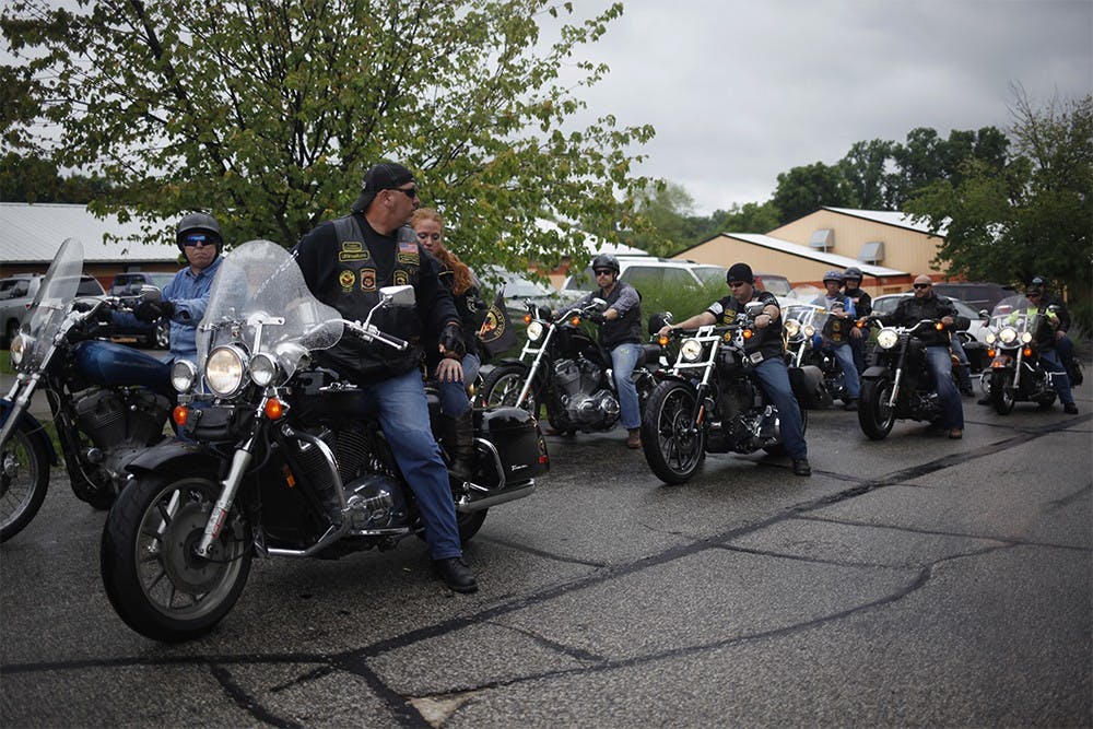 John Higgins, the chapter commander of Combat Veterans Motorcycle Association chapter 14-1, leads a group of motorcyclists as they embark on the "Taste of Freedom Ride"  on Saturday.  The group rode to Nashville, Ind. to explore the shops before returning to Bloomington.
