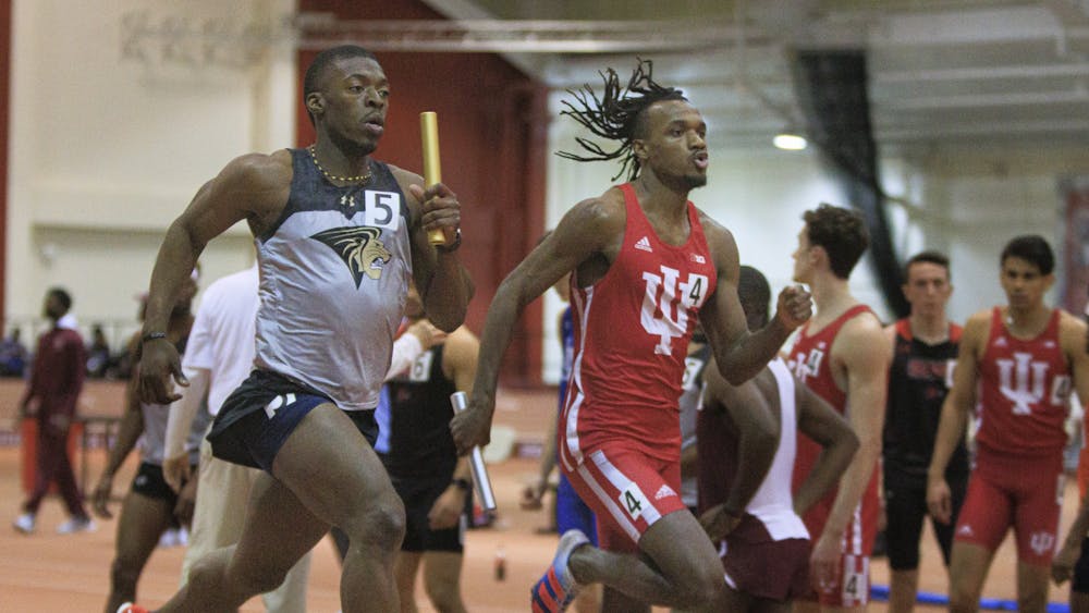 Junior sprinter Micah Camble competes Feb. 11, 2022, at Gladstein Fieldhouse. Indiana finished 2nd in the men&#x27;s 4x400 race. 