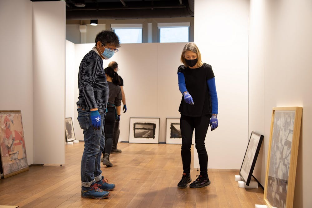 <p>Installation of the “Photographic Occurrences” exhibit in the Cook Center for Public Arts and Humanities. </p>