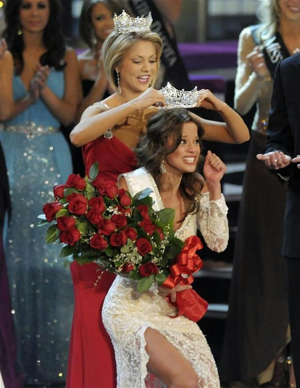 Miss Indiana Katie Stam is crowned Miss America 2009 by Miss America 2008 Kirsten Haglund Saturday in Las Vegas.