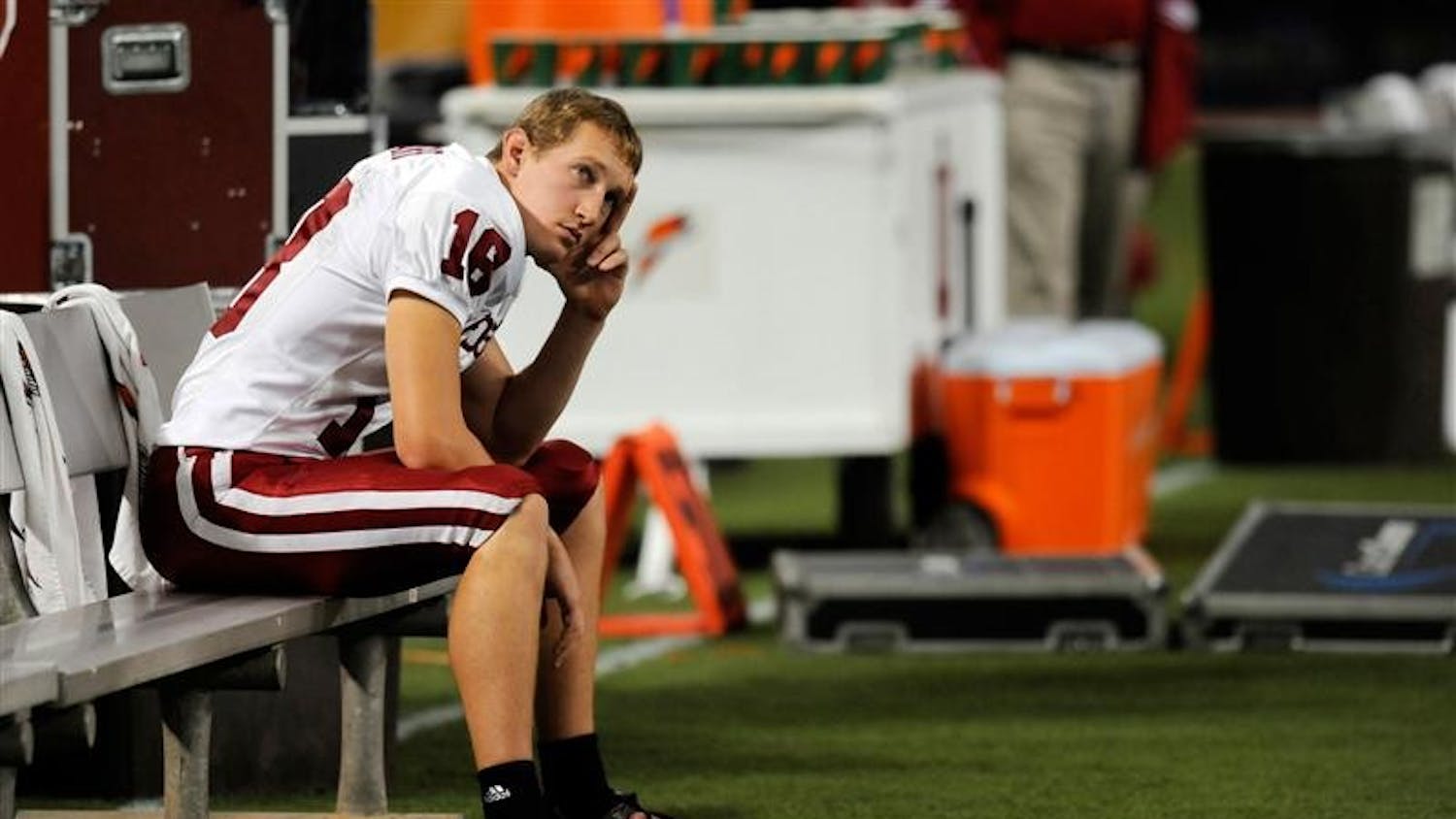 IU kicker Austin Starr watches a replay from the bench during IU's 16-7 loss to Minnesota on Saturday, Oct. 4, in Minneapolis. Starr had no field goal attempts in the game.