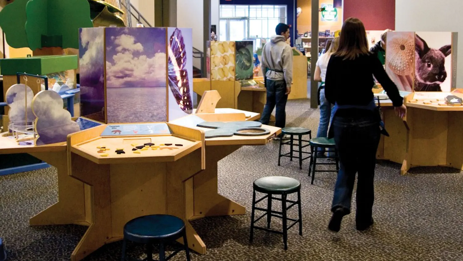 WonderLab visitors explore the center’s new “Nature’s Numbers” exhibit Saturday morning. The exhibit, which opened Jan. 25, contains 20 interactive stations which feature the various patterns and shapes found in living things.