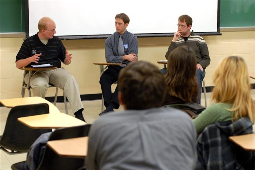 Connor Cadill of Students for John McCain, Aaron Hamlin of Hoosiers for Nader and Andrew Sharp of IU Students for Liberty debate Tuesday night at the Kelley School of Business. The debate covered key election issues with an emphasis on the economy.