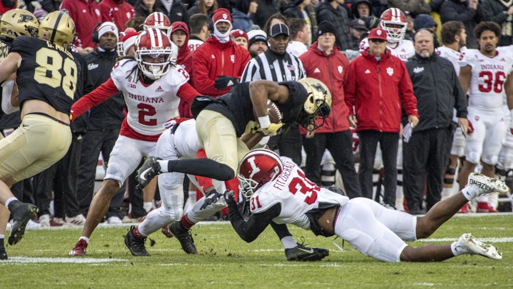 IU redshirt senior defensive back Bryant Fitzgerald attempts to tackle a Purdue ball carrier during the game on Nov. 27, 2021, at Ross-Ade Stadium. Bryant had four tackles in the 44-7 loss to Purdue.